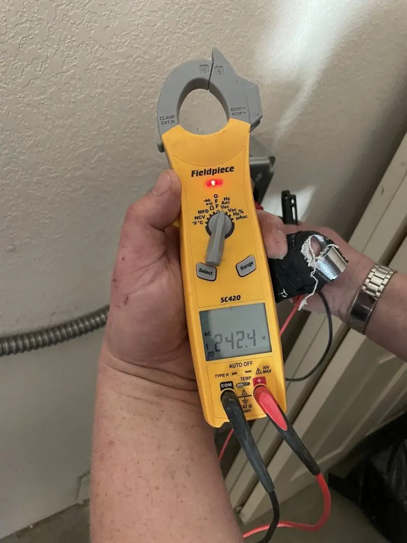 Voltage testing with clamp meter during Generator Installation in Redmond